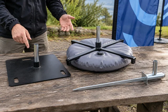 Steel plate cross base and ground spike for portable flag displays